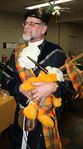 Viscount Sir Morven of Carrick "piping" in the Ancient McReekie Banner
