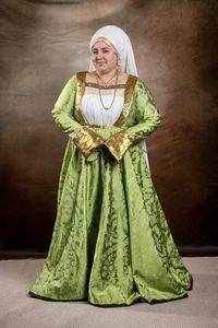 Recreation of extant 16th century gown of Mary of Hungary. Includes all layers of original and is entirely handsewn. Silk damask and "cloth of gold" brocade, lined with linen and wool.