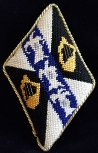 Finella Harper Quarterly argent and sable, on a bend azure between two harps Or three jester's hoods argent. Mistress Finella was added to the Order of the Pelican by TRM [Patrick I and Kara I] on January 9, AS XLIV (2010).