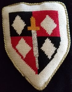 John ap Gwyndaf of Holdingford Quarterly sable and gules, a sword inverted between 4 lozenges, all within a bordure argent Additional information.