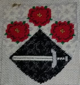 Plain text display Per chevron argent and sable, three roses in chevron proper and a sword fesswise argent. (Mounting pending)