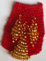 Angel pin designed and knit for Baroness Flavia Beatrice Carmigniani, 2008