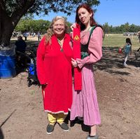 Her Ladyship Viacress Honorée la Charmante presenting Meggan of the Angels with her first SCA favor at the Lyondemere Arts and Archery Event, Spring A.S. LVI (2022).