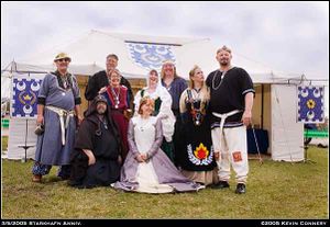 Front: Keradwc an Cai and Miscel of Lyonesse, founding Baron/Baroness, Back: Richard of Black Iron (2nd Baron), Antonius Tesel and Créd Mongfind Örnardóttir (3rd)' Aoibheall an Sionnach and Conall mac Seaghain (4th), Isidora Ell'eva and Conrad Breakring (5th and current at the time of the photo), 2005.