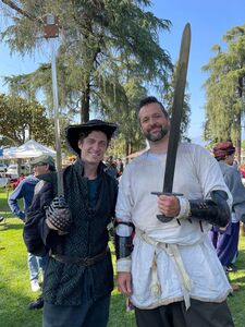 Victors of the martial tournaments with their prizes: (L to R) Skraddare Vorst (rapier) and Kenari William Ulfsson, KSCA (armored)