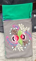 Belt favor for Lady Alianora MacMahan. Hand embroidered design sewn to be hanging on fighting or other belt. 2022