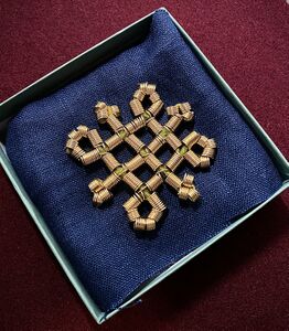 Finnish Iron Age wire coiled decoration, gifted to HRM Queen Lorissa du Griffin.