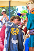 Beorn undergoing Herald Ceremony with TRMs Valentine and Brocc, Gyldenholt Anniversary, 2025. Photo by THL Suleiman ibn Rawh