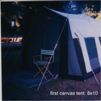 Multi-coloured 8x10 tent was made with four 8ft wooden corner poles and two 10ft poles with another 10ft aluminum rod as the roof pole. It had a screened window [that zipped up at night] on one side & another in the back, level with the side poles 12in x 30in for cross-ventilation – this tied from inside. The "door" could be tied shut.
