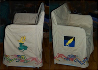 Colm Kyle & Honour Greenhart chaircovers: 100% cotton duck base. The devices were appliqué & put on the pockets of the chairs – one on each side. Because they had a doggie, knotted dogs ran around the hem & were painted with thinned acrylic paint (from Home Depot).
