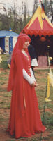 Red Gown: Inspired by 1300 gown. Made from a medium weight 100% wool, it laced up the front [for convenience] instead of buttoning. The undergown was 100% cotton & the veil was a silk/rayon blend.