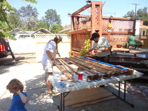 Lady Juliana and Lord Sigbiorn Sigmundarson staining poles.