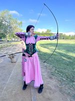 Meggan of the Angels practicing target archery