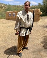 Robert the Best shooting target archery at Potrero War A.S. LVII (2022).]]