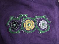 HRM Roisin Step down forepanel embroidery. Hand embroidered decoration for Norse inspired forepanel. This item is made on linen with cotton DMC floss. This is a one of a kind piece.